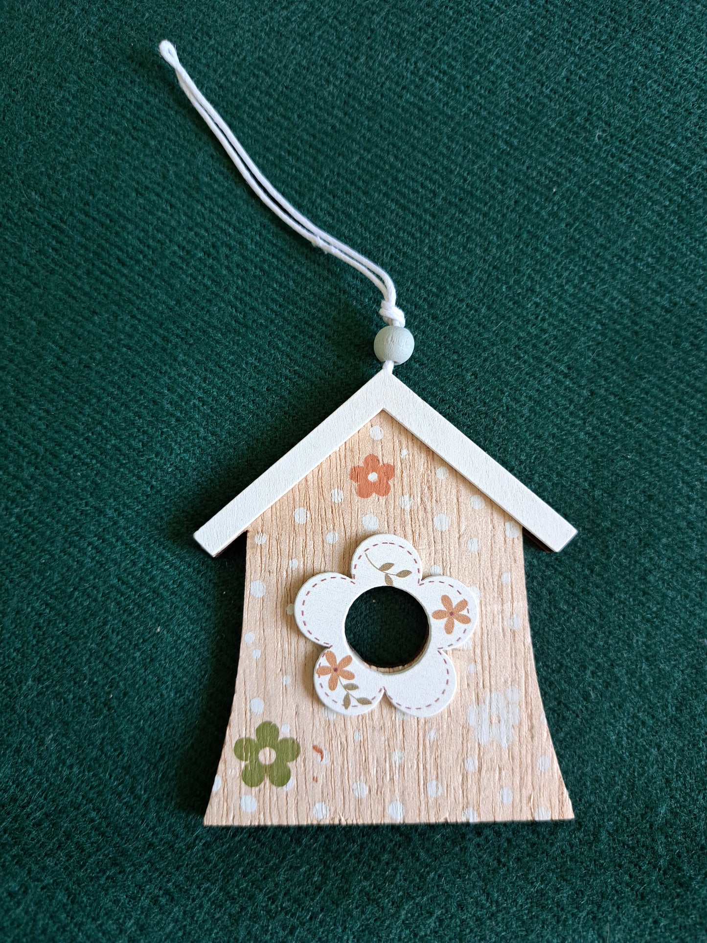 A Birdhouse Shaped Wooden Pedant