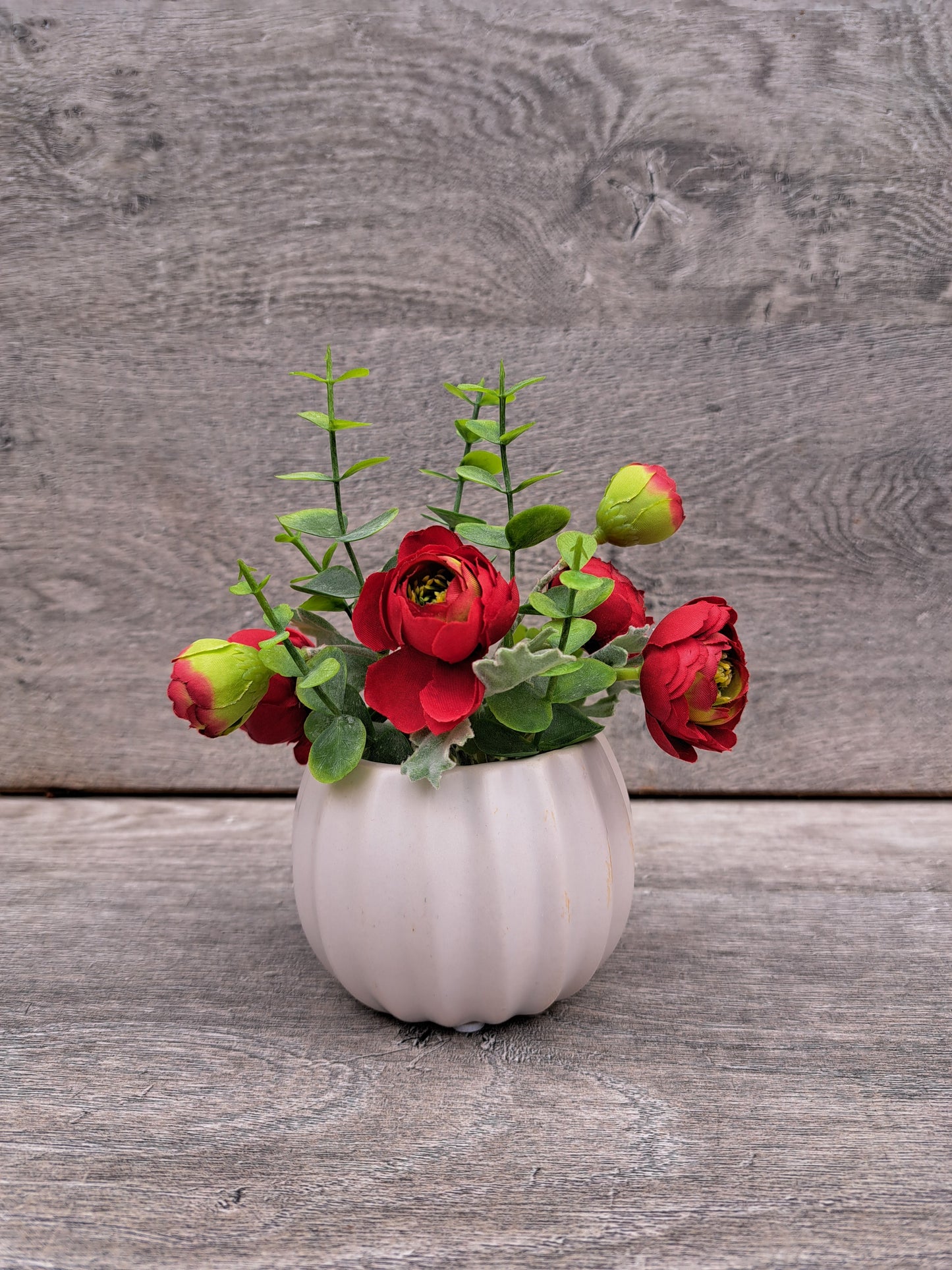 An Artificial Peony Rose Flowers in the Pot for Office or Home Decor