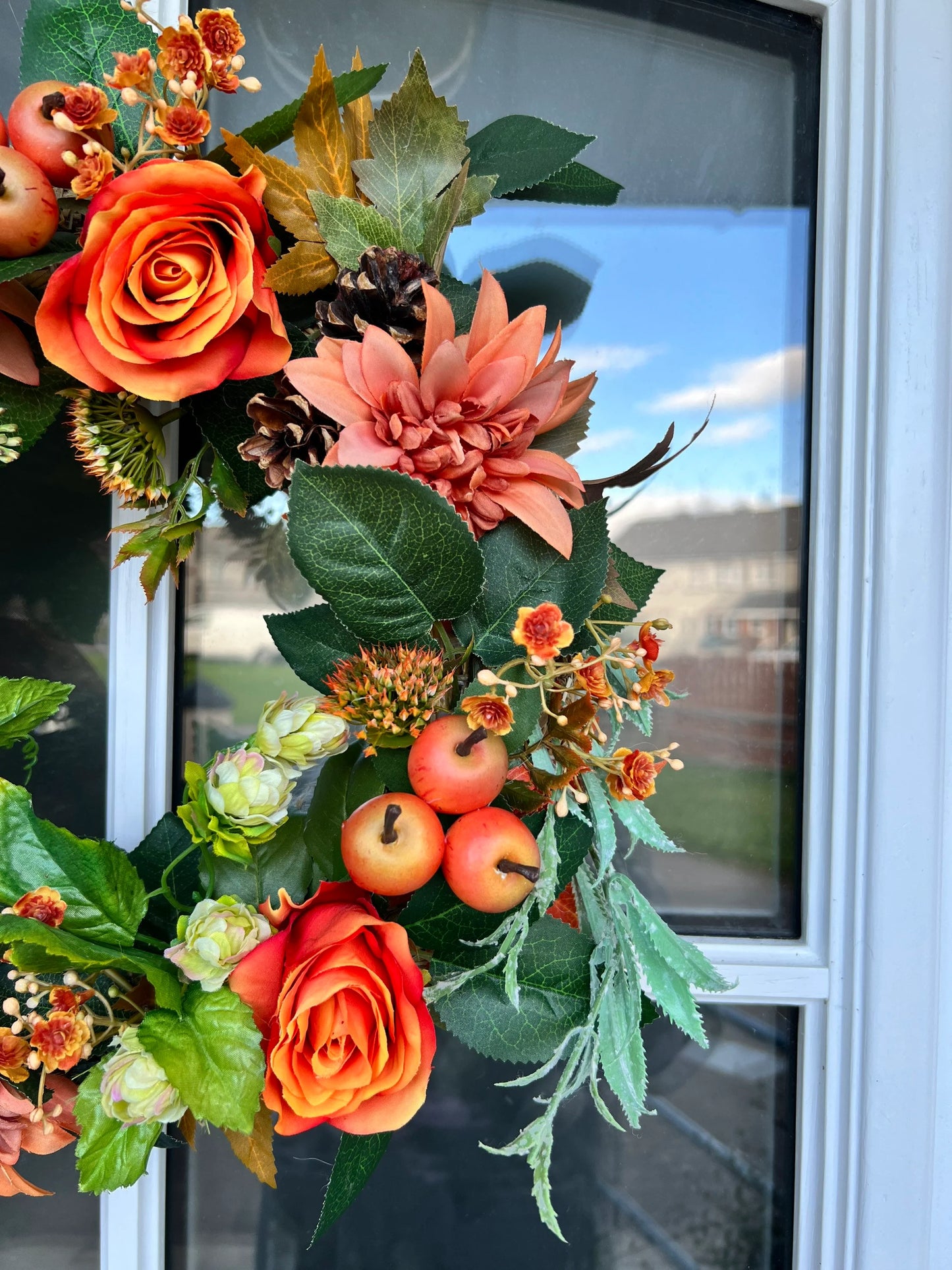 Green and orange artificial flower wreath. Roses Apples Poppy head Pinecone 45cm (18”)