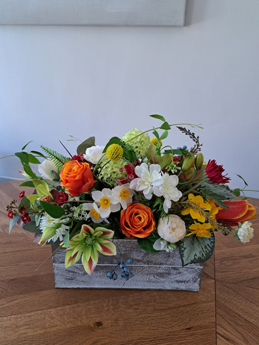Artificial Flower Arrangement in Wooden Box as an Office or Home Decoration