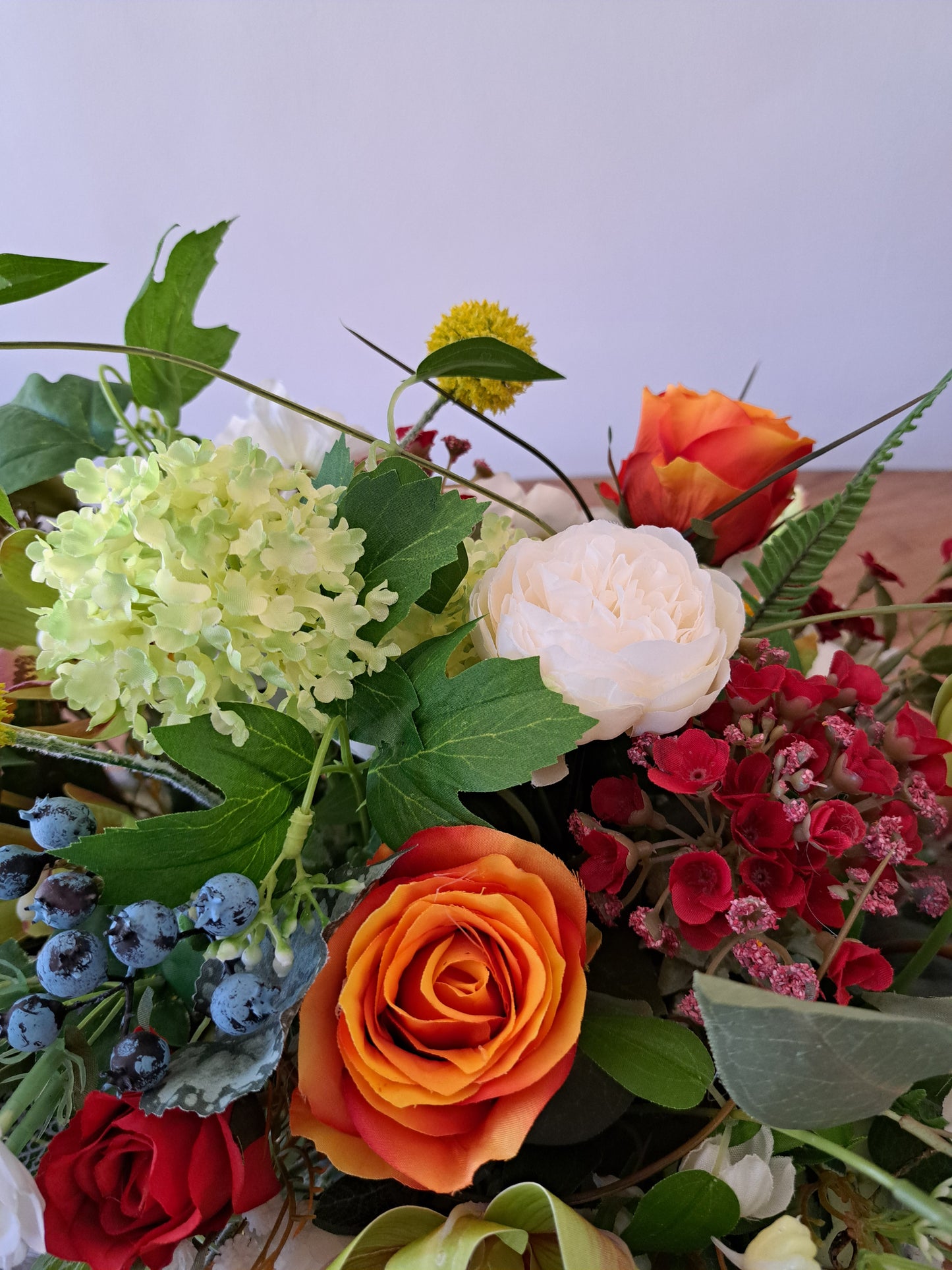 Artificial Flower Arrangement in Wooden Box as an Office or Home Decoration