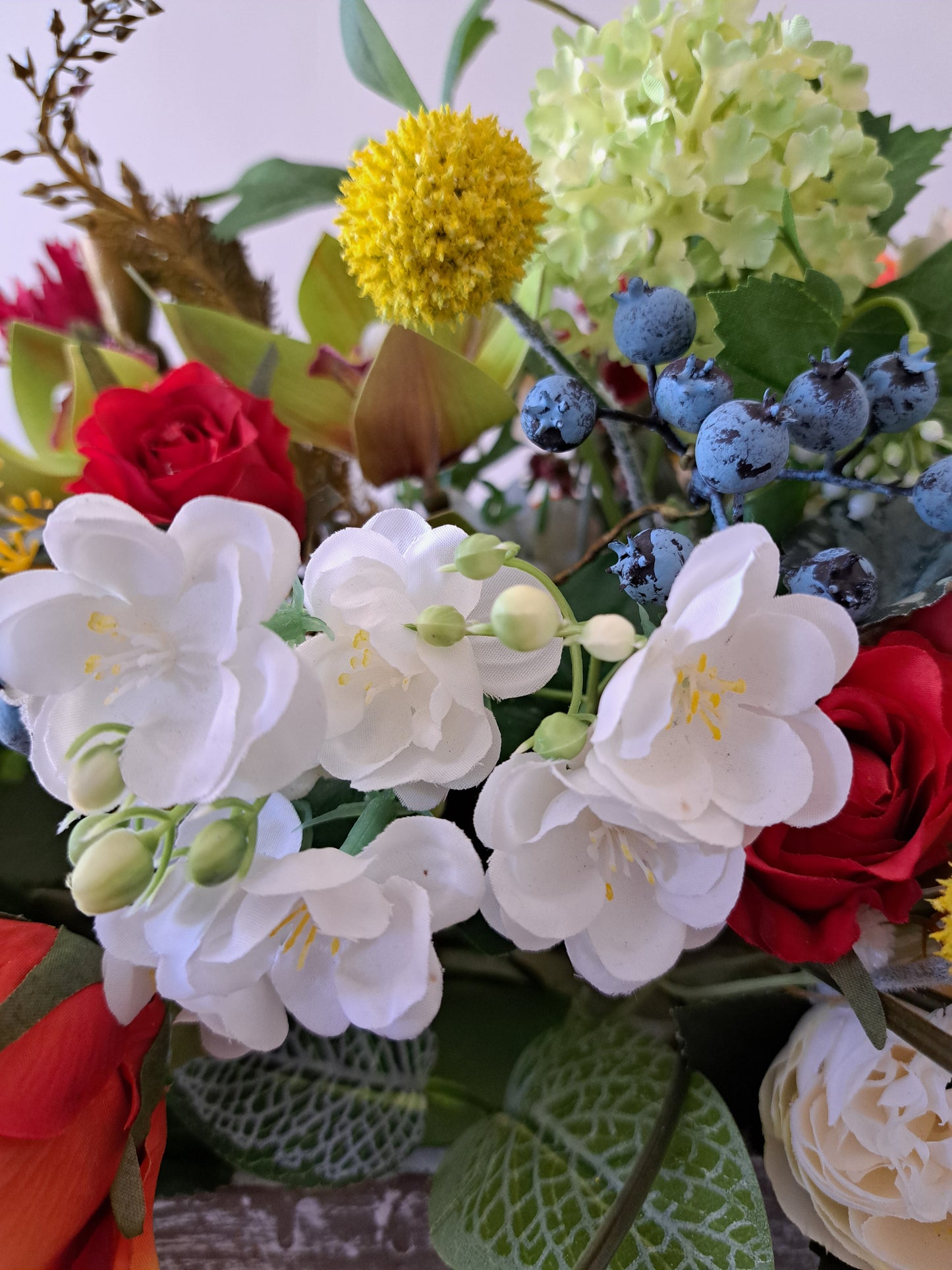 Artificial Flower Arrangement in Wooden Box as an Office or Home Decoration