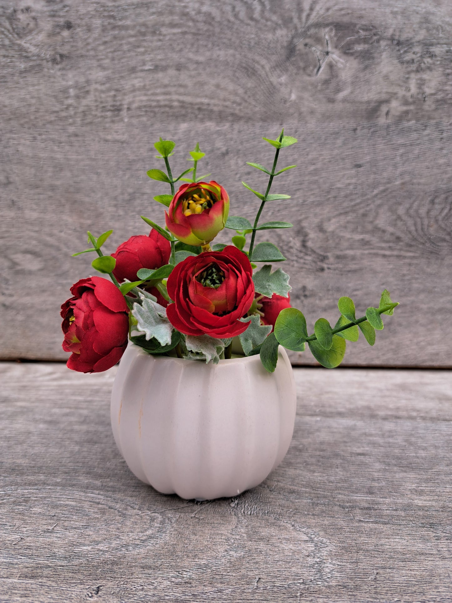 An Artificial Peony Rose Flowers in the Pot for Office or Home Decor