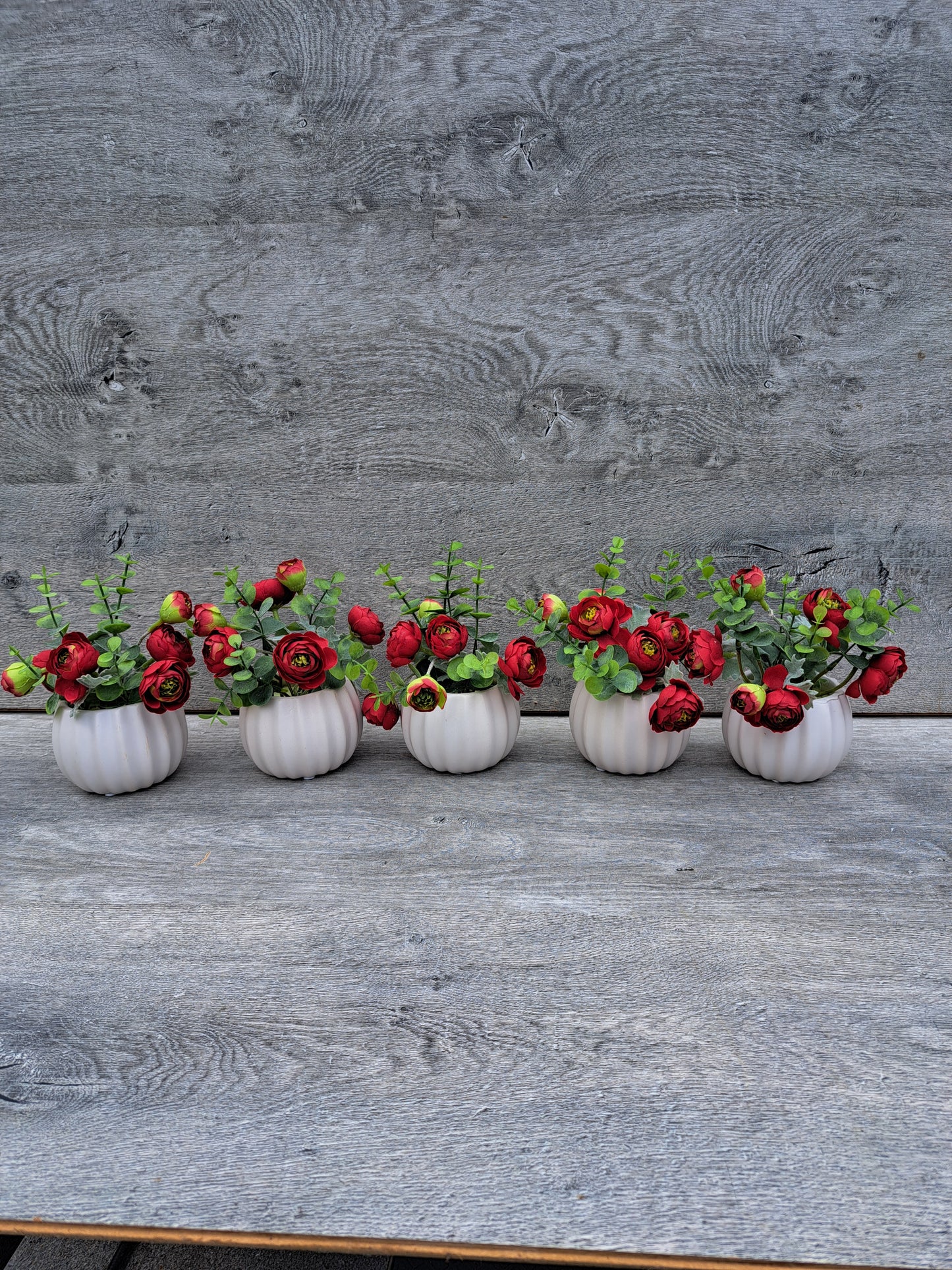 An Artificial Peony Rose Flowers in the Pot for Office or Home Decor