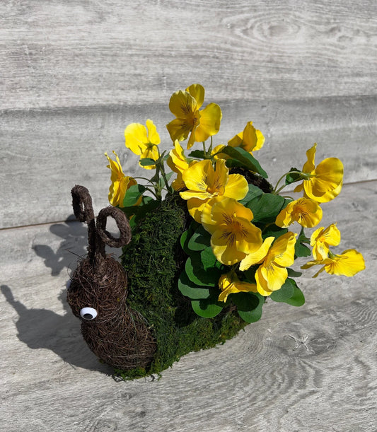 Yellow Artificial Pansy in a Vine Snail Basket with Moss