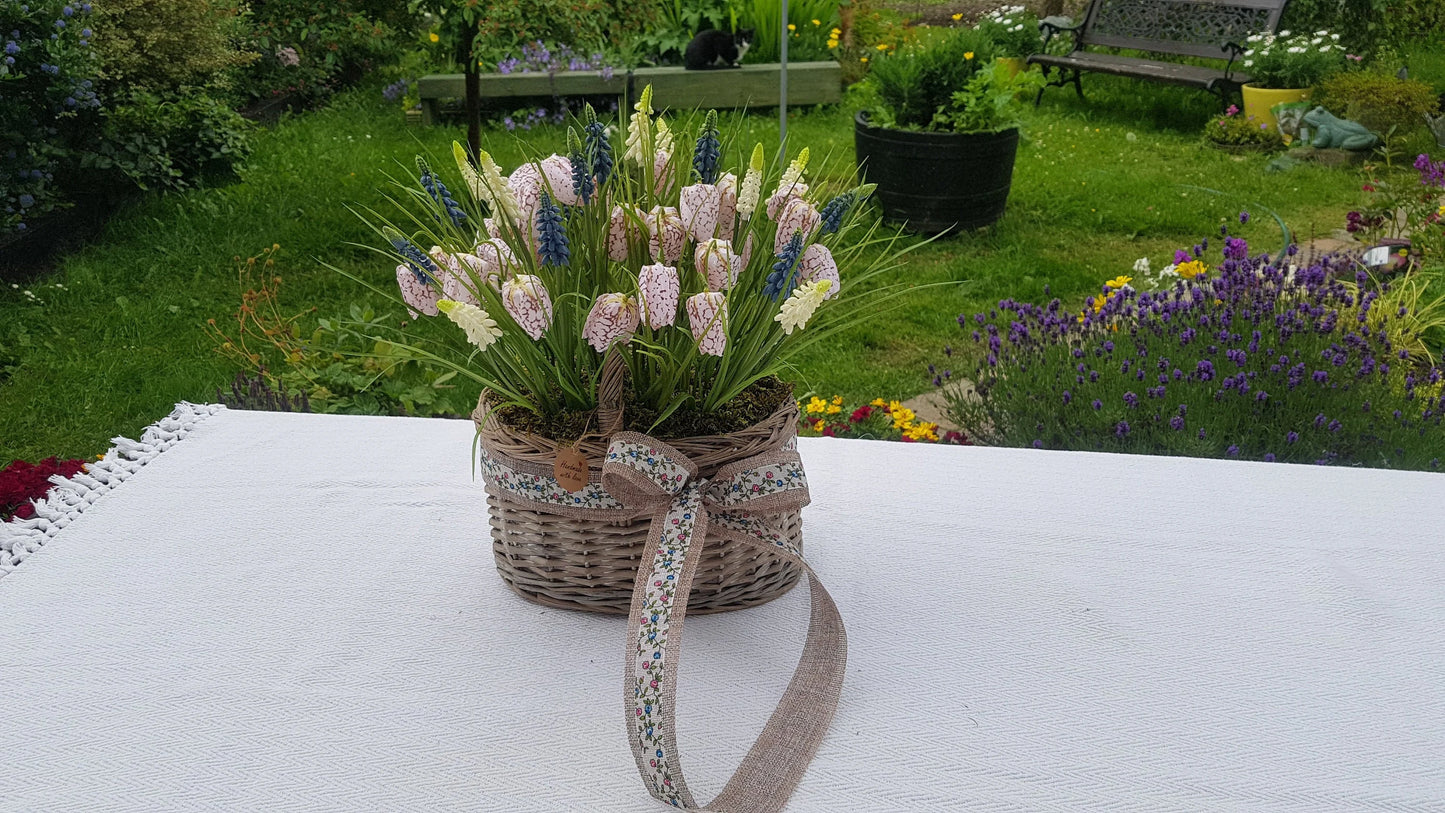 Artificial Flower Arrangement in Wicker/Willow Basket. Snake's Head (Fritillaria meleagris) Grape Hyacinth Grass Natural Moss