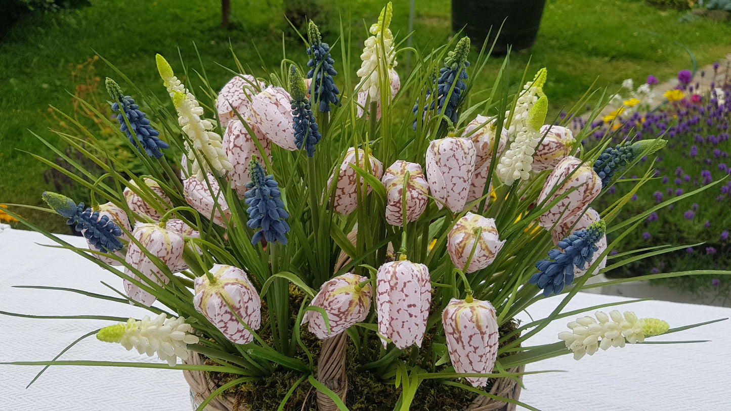 Artificial Flower Arrangement in Wicker/Willow Basket. Snake's Head (Fritillaria meleagris) Grape Hyacinth Grass Natural Moss